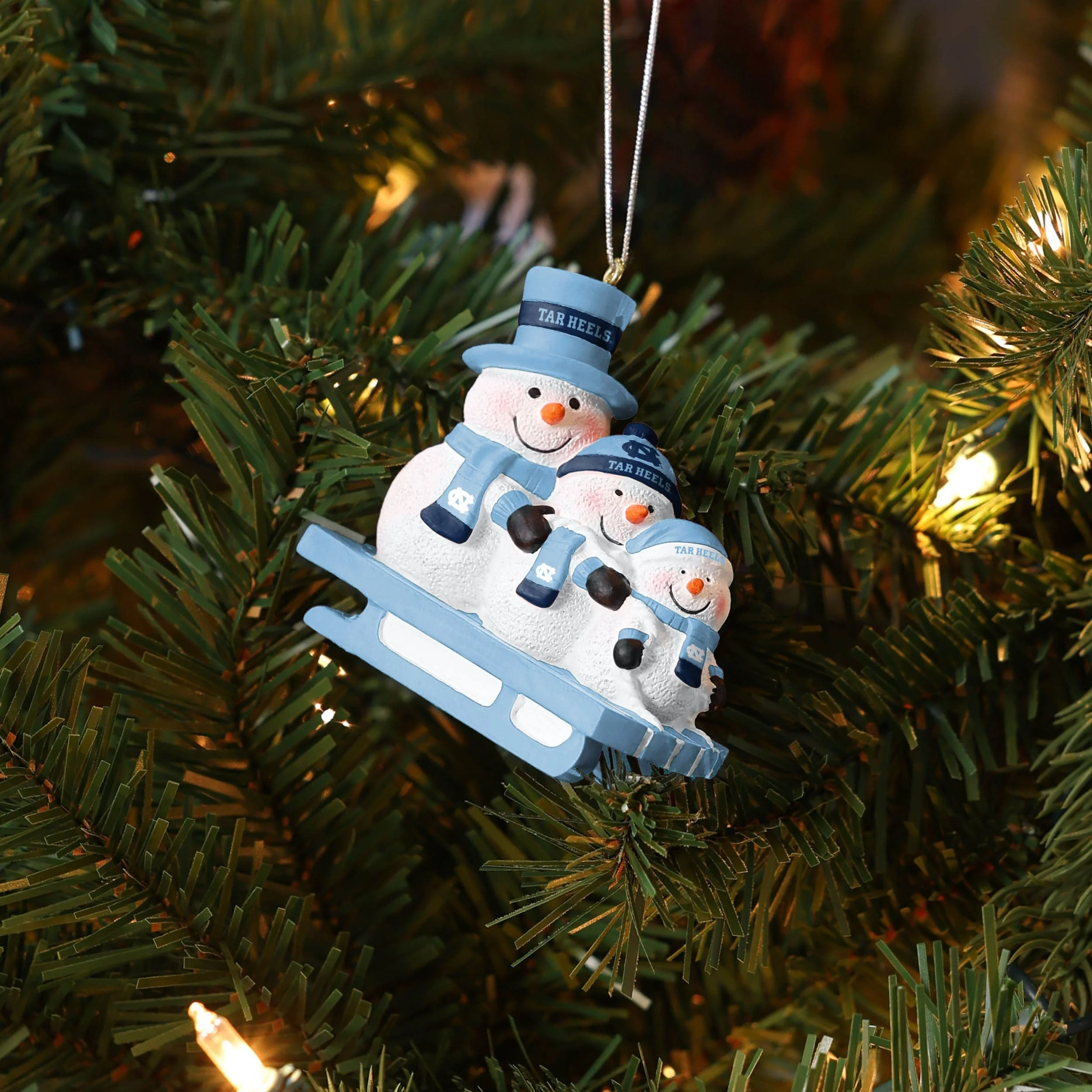 North Carolina Tar Heels NCAA Sledding Snowmen Ornament - Image 4